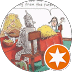 A cartoon of the Tin Man at a dinner table with hay and oil cans, as a woman and girl look on. The Tin Man says, “I love this party.” An orange star badge with a white check mark appears in the corner—perfect for a Denton Texas chiropractor ad.